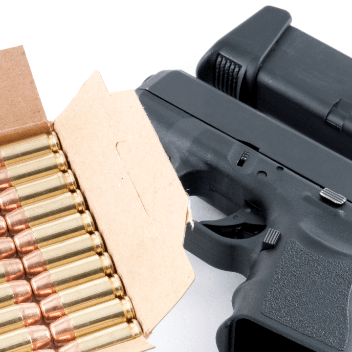 A picture of a handgun and ammo