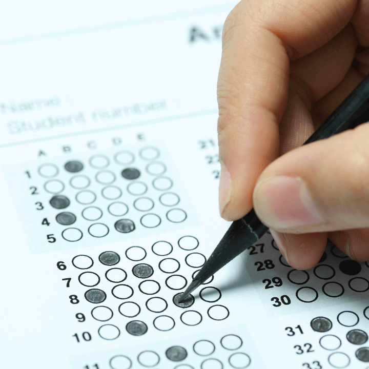 This image shows someone filling in answers on a multiple choice exam.