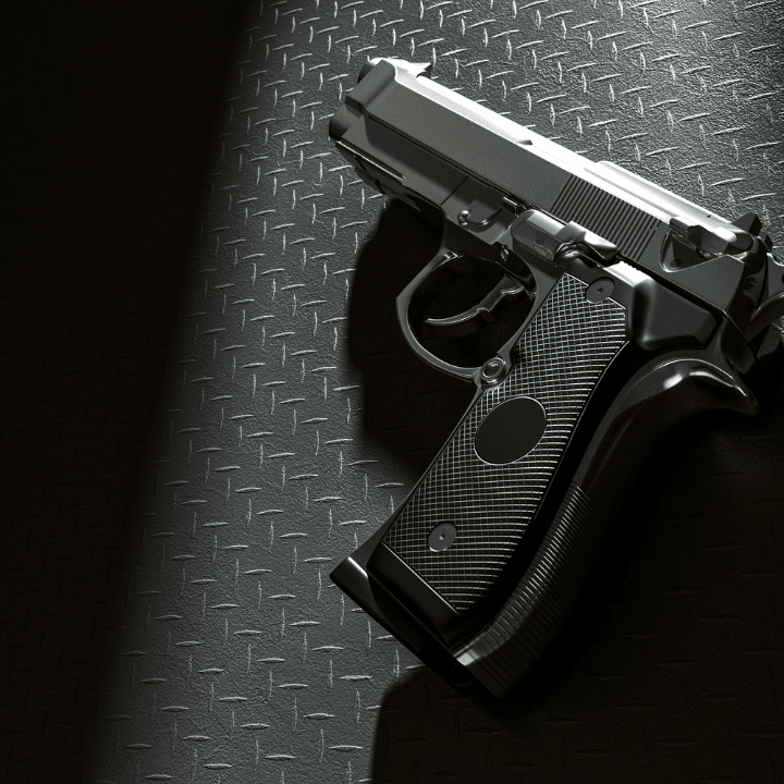 A picture of a handgun on a wall.