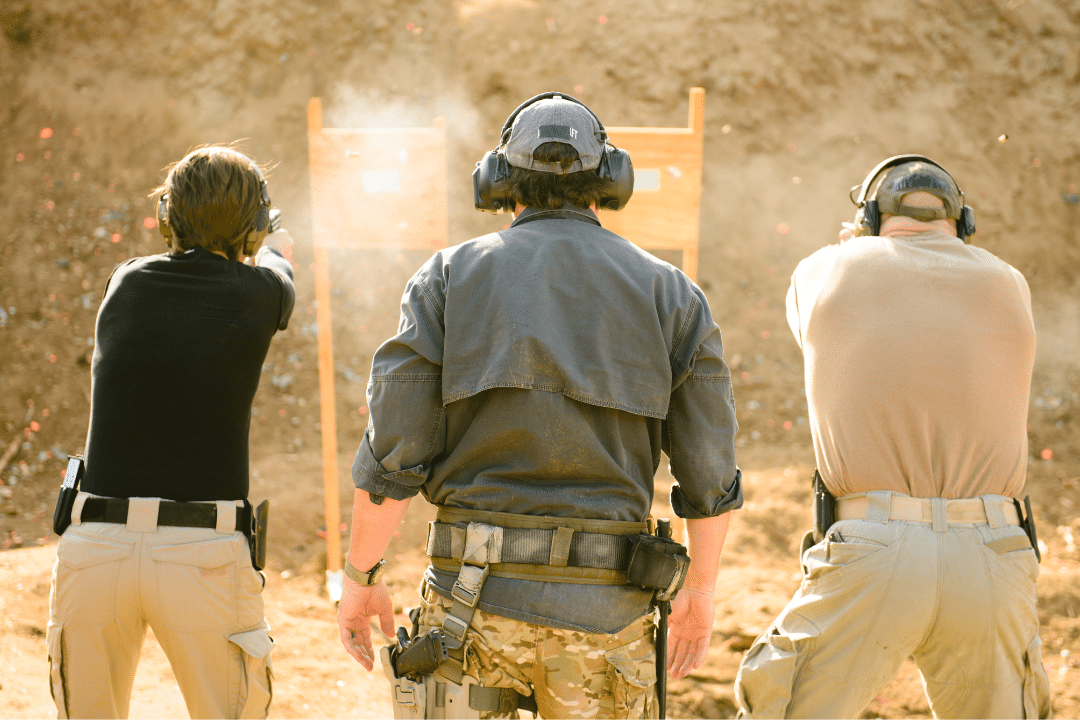 Students at firing range practicing shooting.